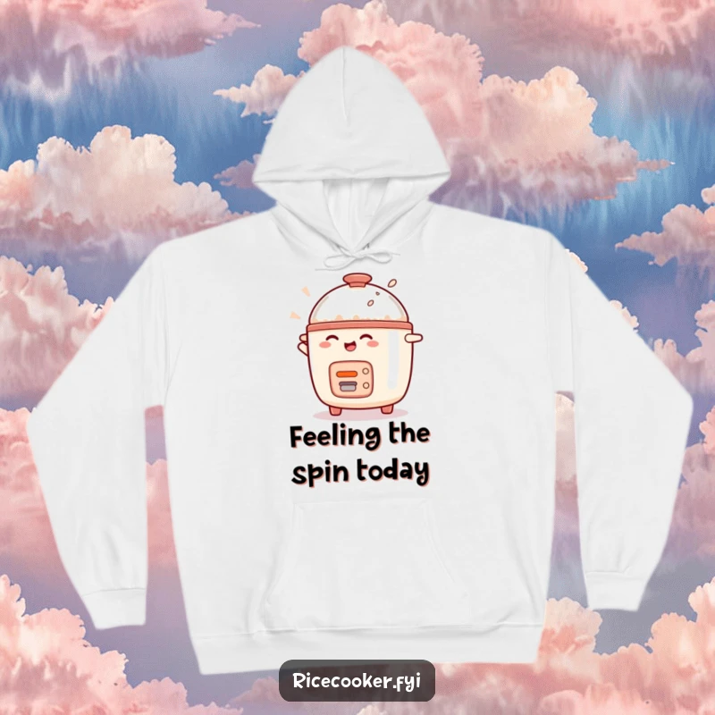 Funny rice cooker character in mid-spin, radiating happiness, printed on a cozy hoodie for kitchen humor fans.