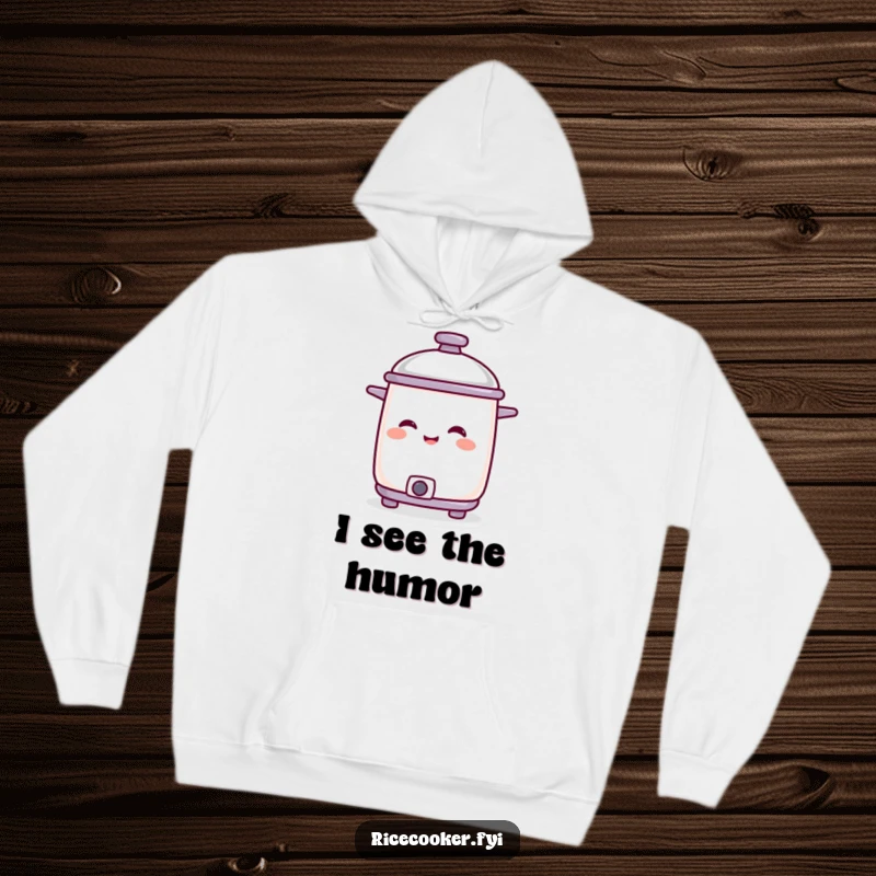 Funny smiling rice cooker character, lid tilted in amusement, featured on a cozy and humorous hoodie.
