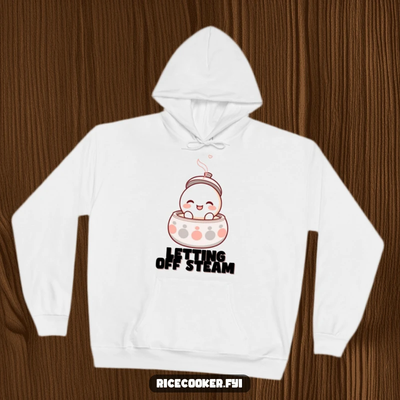 Funny hoodie featuring a round, smiling character popping its lid open with gentle steam, symbolizing warmth and comfort.