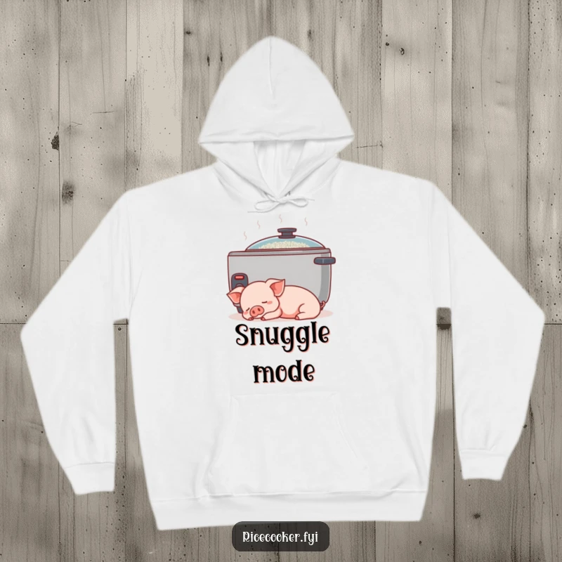Funny piglet hoodie. A content piglet naps peacefully beside a gently humming rice cooker, offering cozy vibes.