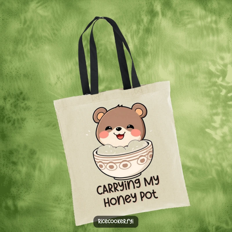Funny bear with a big grin popping out of a steaming bowl, ready to hold your belongings in this humorous tote bag.