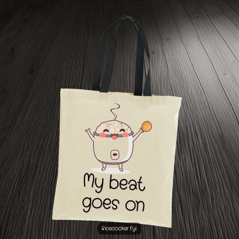 Funny tote bag depicting a dancing rice cooker with a twirling ladle, a humorous and practical accessory for kitchen dancers.