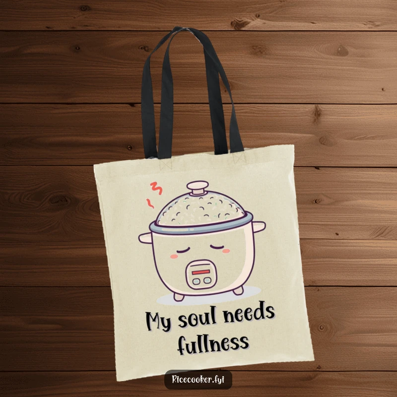 Funny tote bag featuring a sleepy rice cooker, dreaming of more rice, perfect for shopping or everyday use.