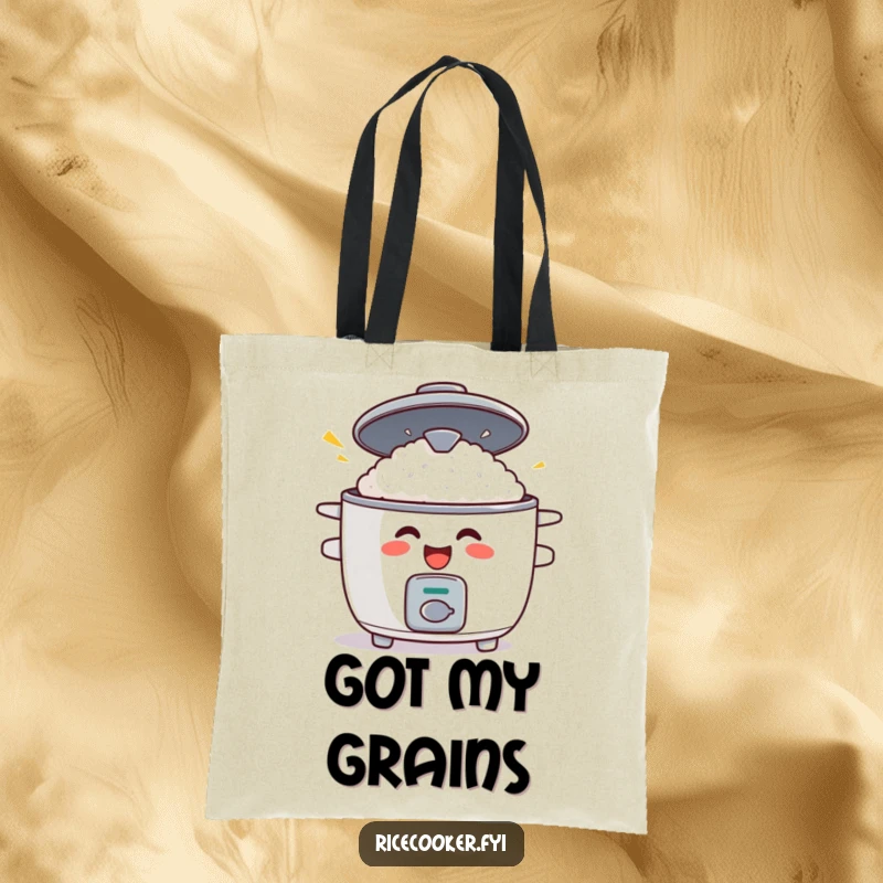Funny tote bag with a grinning rice cooker whose lid is popping open in surprise, great for groceries and kitchen humor.